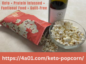 Open bag of protein popcorn and bowl full with a bottle of wine