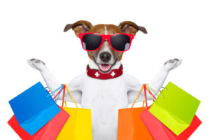 Shopping Dog with sunglasses and lots of colorful shopping bags and a huge smile. Free Apps is what you need